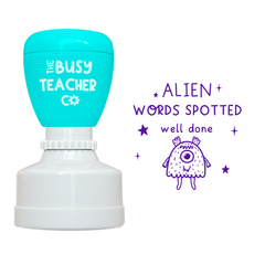 Refillable primary teacher Stamp reading 'alien words spotted', inked in purple ink.